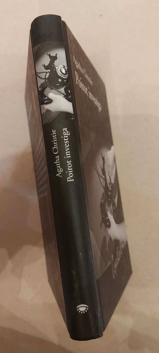 Agatha Christie . Poirot Investiga