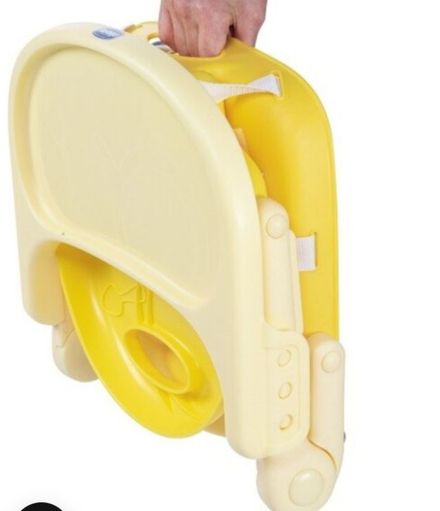 Trona de viaje plegable.