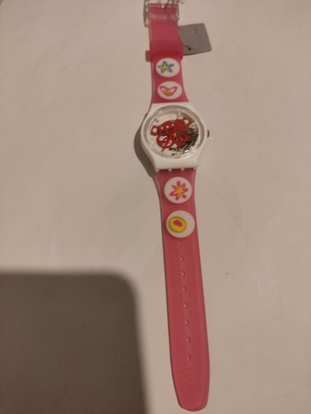 Reloj marca Swatch diámetro 33 mm.