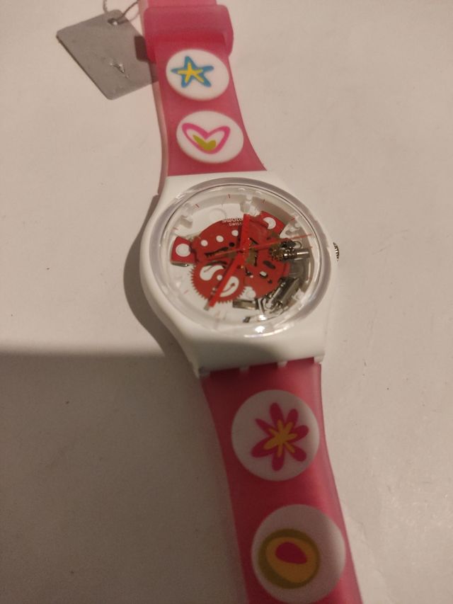 Reloj marca Swatch diámetro 33 mm.