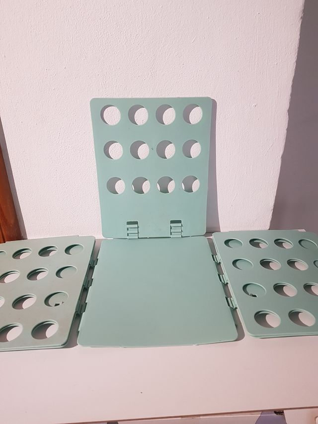 Tabla para doblar camisetas