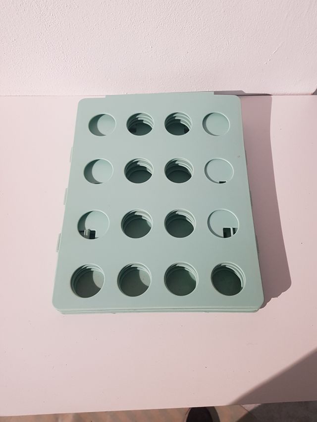 Tabla para doblar camisetas