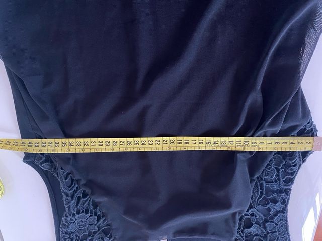 Abito tubino nero in maglina con inseriti in pizzo