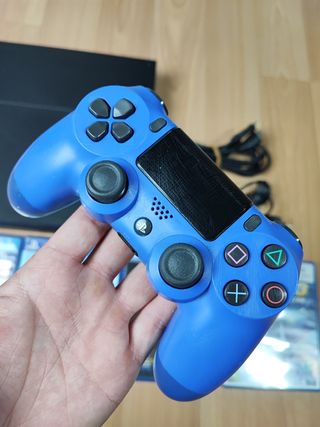 PlayStation 4 500gb + mando + 4 juegos