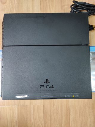 PlayStation 4 500gb + mando + 4 juegos