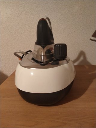 Plancha marca Saxem como nueva
