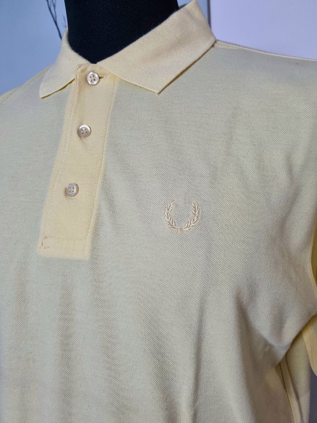 Polo color giallo chiaro, nuova taglia.L