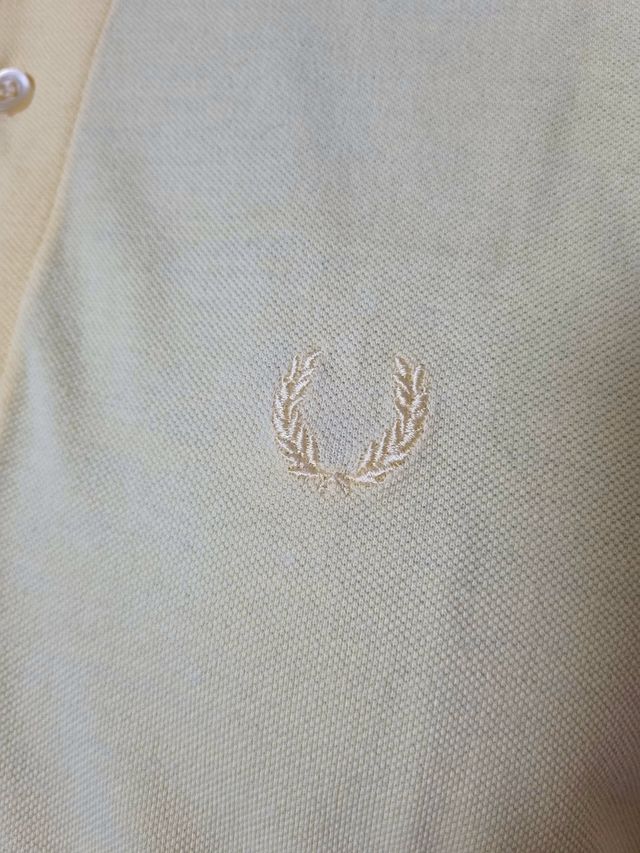 Polo color giallo chiaro, nuova taglia.L