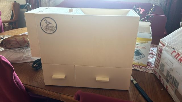 recolector de polvo de pájaros