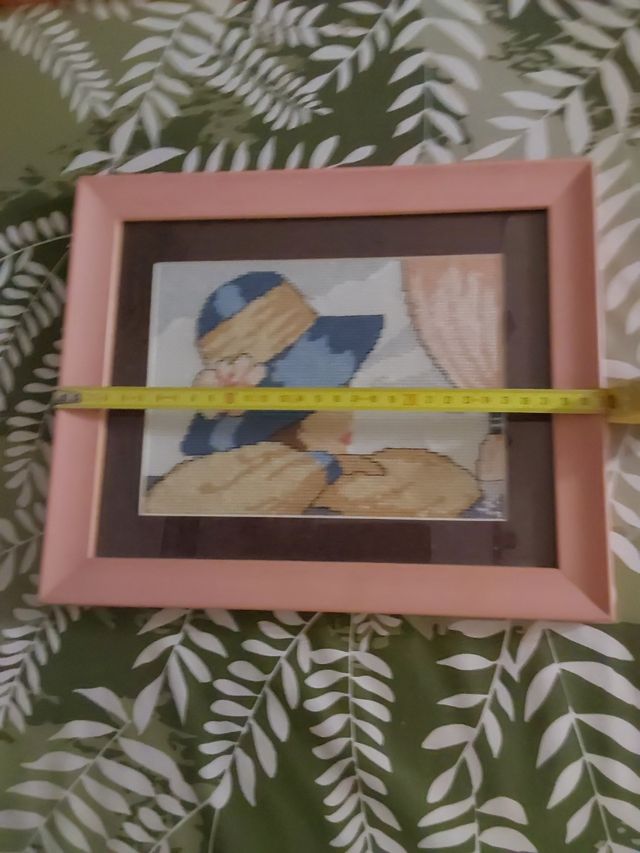 Cuadro punto cruz,mujer en la ventana