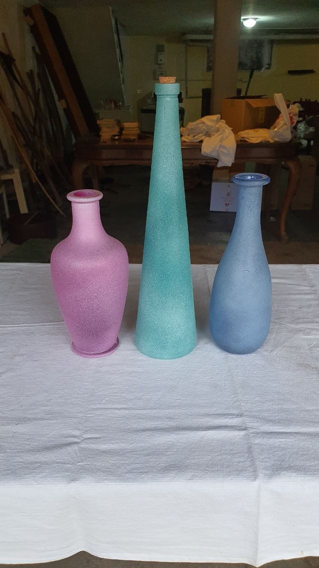 Bottiglie di vetro sabbiato