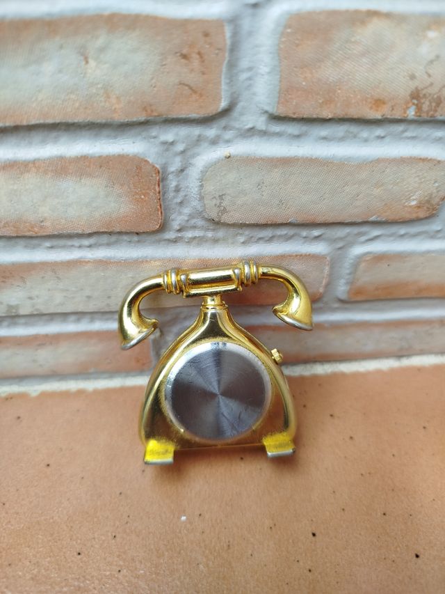 Reloj de dado y teléfono de colección