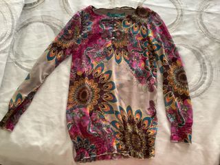 Blusa desigual transparente