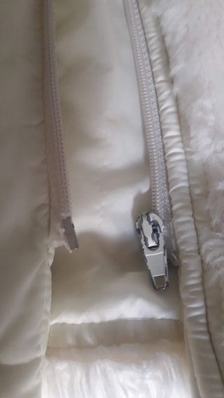 Abrigo peluche niña 12 años. El largo son 64 cm