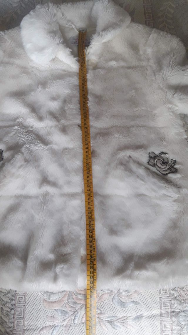 Abrigo peluche niña 12 años. El largo son 64 cm