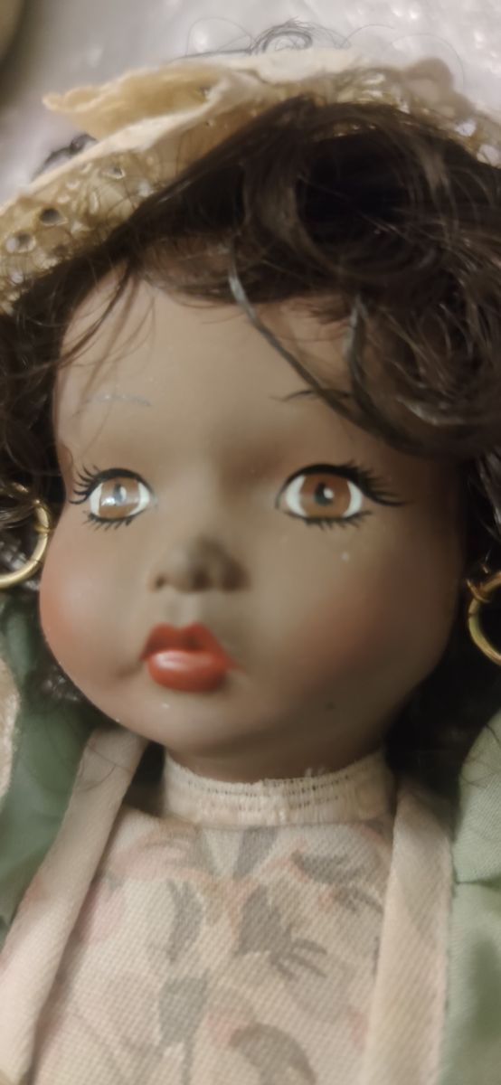 Muñeca de porcelana vintage