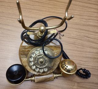 Teléfono antiguo mármol