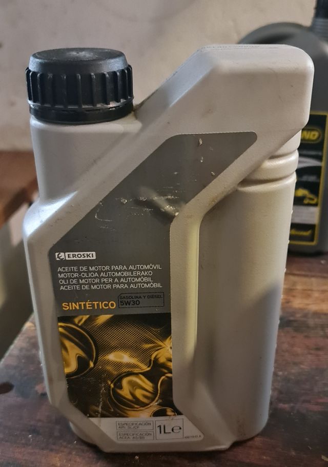 Lotto 4 bottiglie di olio per motori