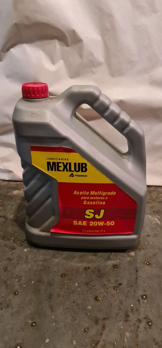 Lotto 4 bottiglie di olio per motori