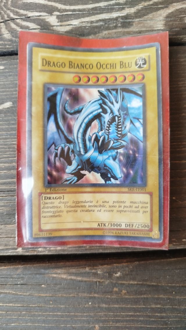 DRAG BIANCO OCCHI BLU+BUSTINA