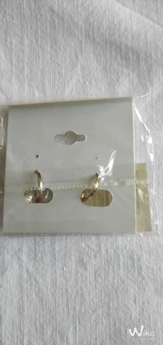 Orecchini fiore bianchi e argento con pendente