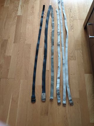 Cinturones, correas para atar maletas.