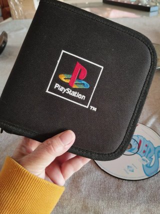 Estuche funda oficial play station y juegos