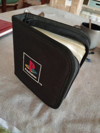 Estuche funda oficial play station y juegos