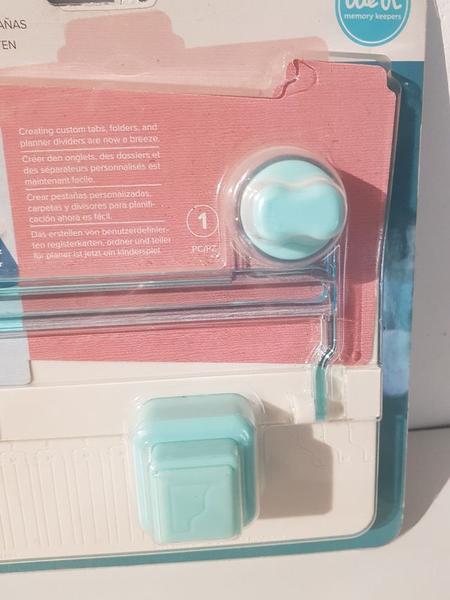 Tablero perforador de pestañas manuali