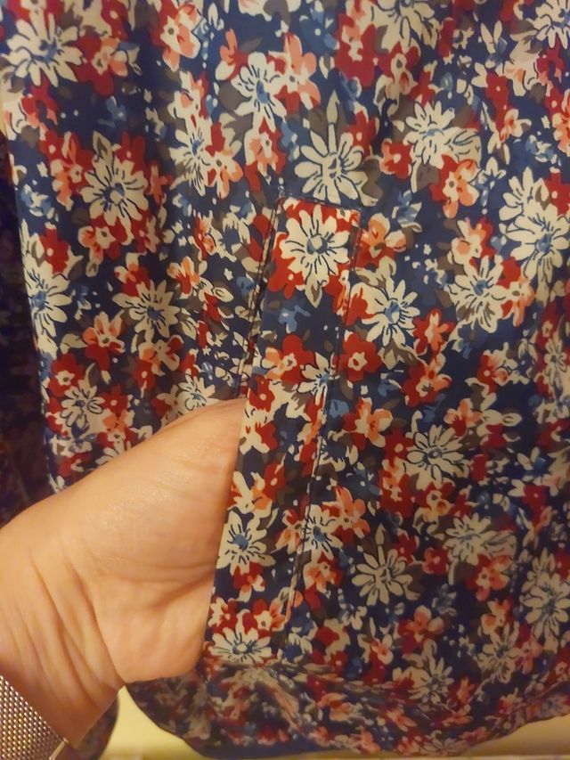 Impermeable reversible con capucha