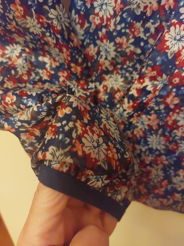 Impermeable reversible con capucha