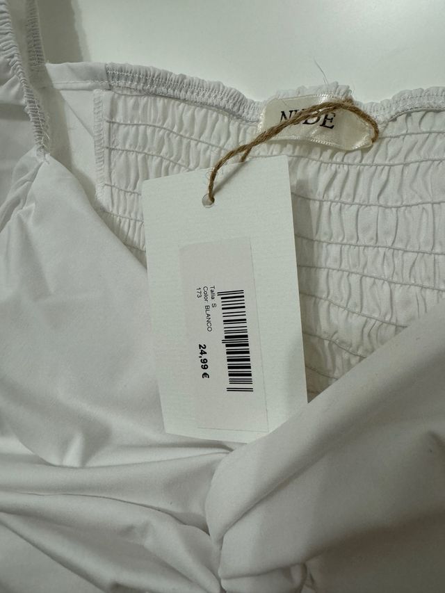 Top de manga corta abullonada