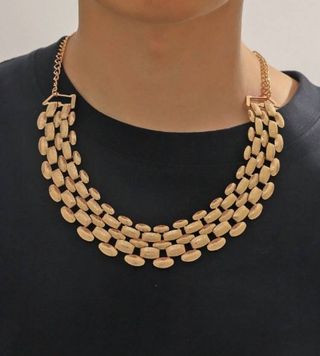 Gargantilla y brazalete dorado 