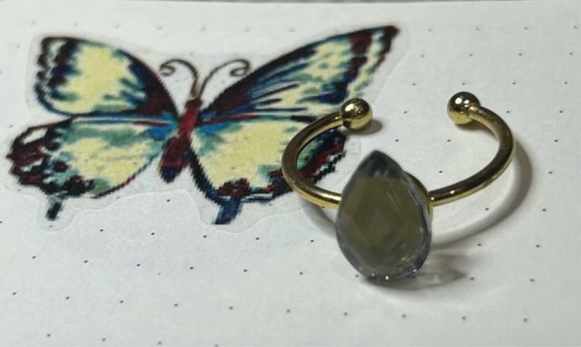 Anillo acero y lágrima cristal azúl