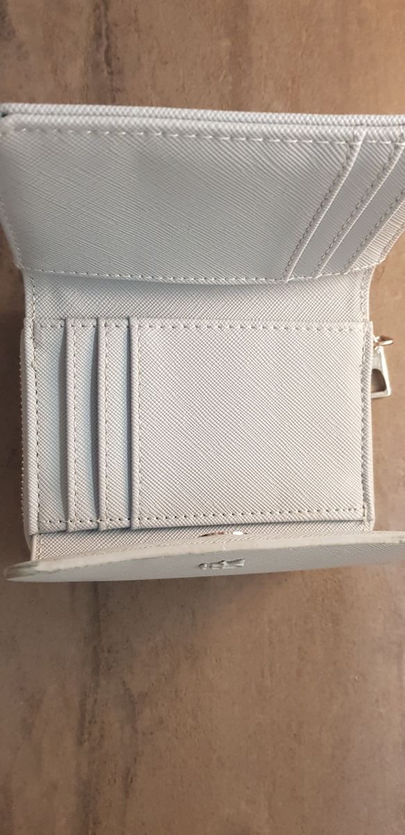 Monedero marca parfois