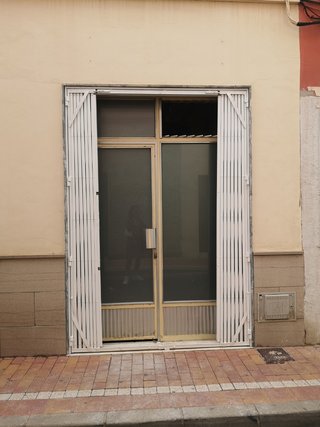 Reja metálica abatible local comercial