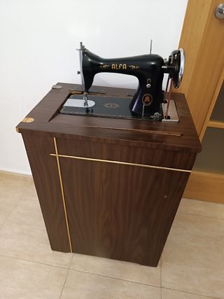 Maquina de coser alfa antigua