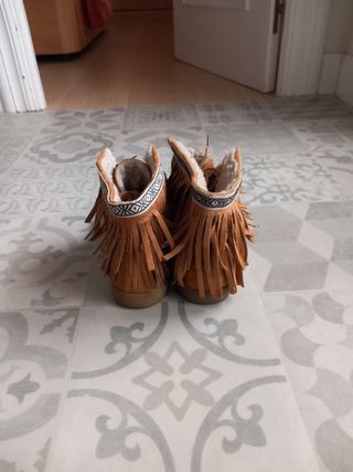 Zapatos con flecos