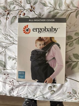 Mochila portabebe y protector impermeable