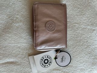 Monedero Kipling mediano rosa metalizado