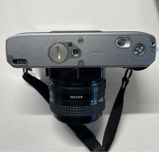 Cámara de fotos Minolta X-300 y objetivos