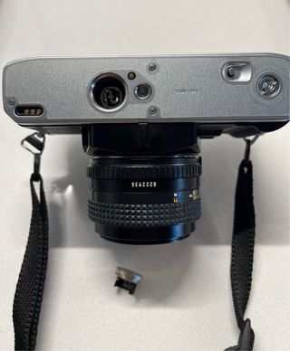 Cámara de fotos Minolta X-300 y objetivos