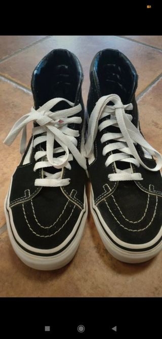 Vans altas negras