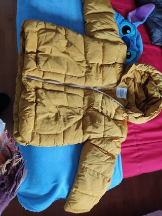Cazadora, plumas niña