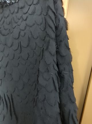 Falda corta estilo plumas 