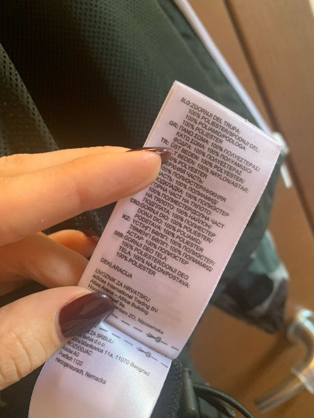 Giacca a vento adidas unisex