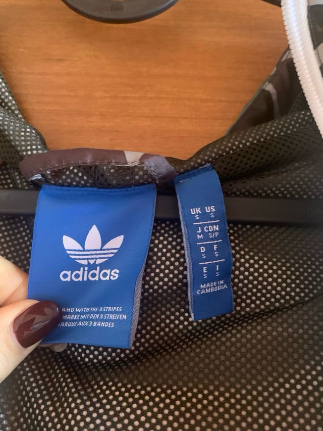 Giacca a vento adidas unisex