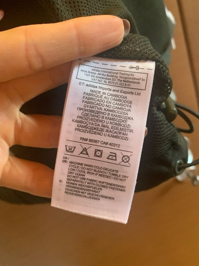 Giacca a vento adidas unisex