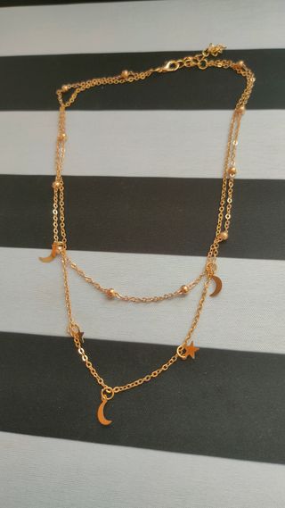 Gargantilla dorada lunas y estrellas