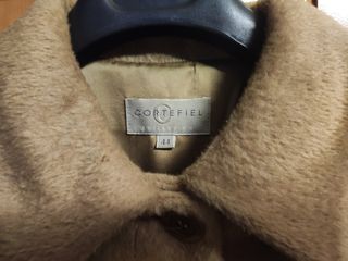 Abrigo beige pelo camello de Cortefiel